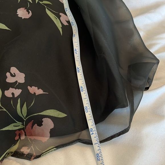 Jenny Yoo Cassie
Flutter Sleeve
Surplice Gown
Black with Floral Pattern. - Picture 13 of 17